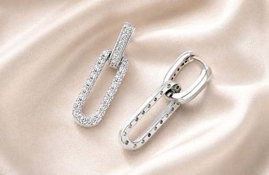Silver diamond link earrings on satin